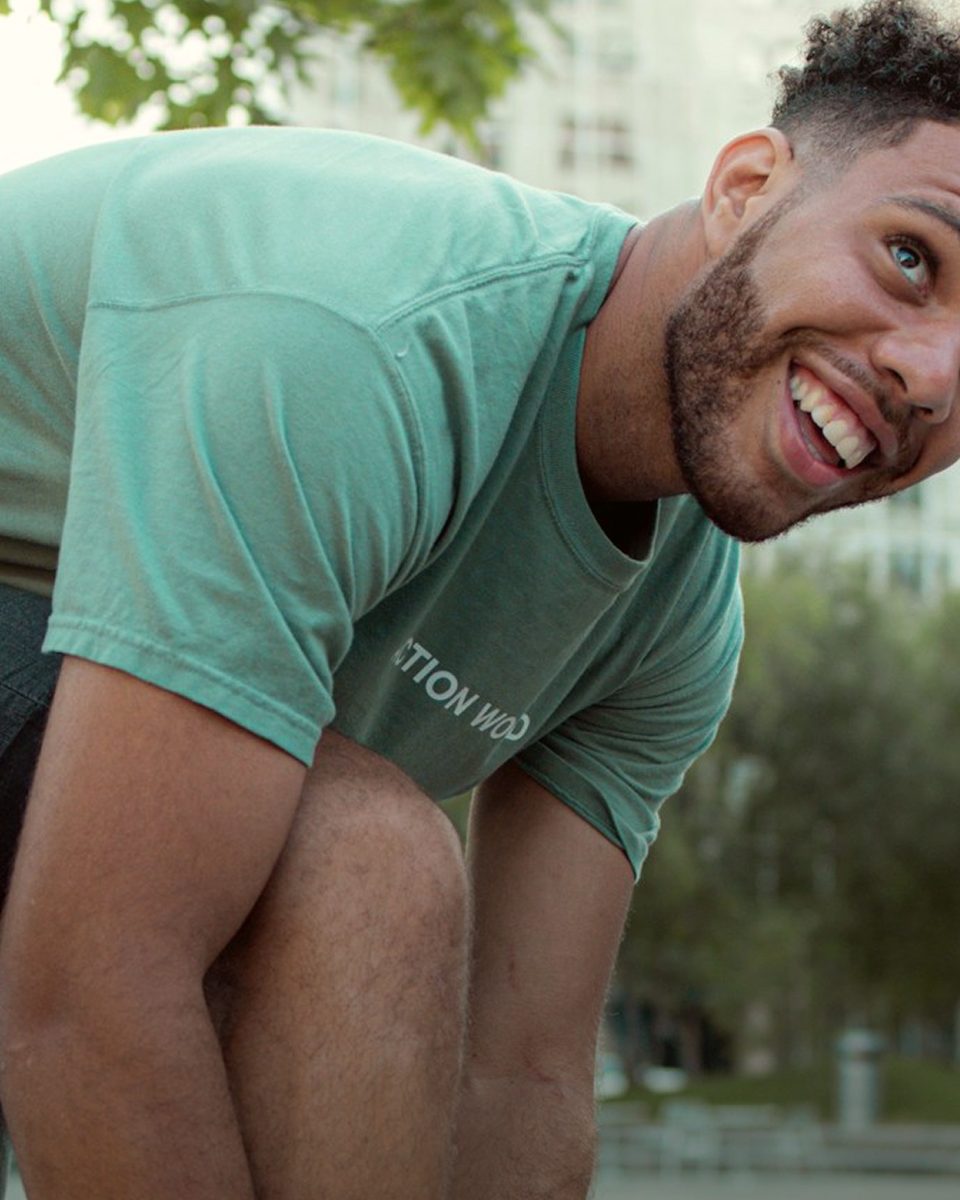 Person stretching outdoors before a run, representing the Discipline phase